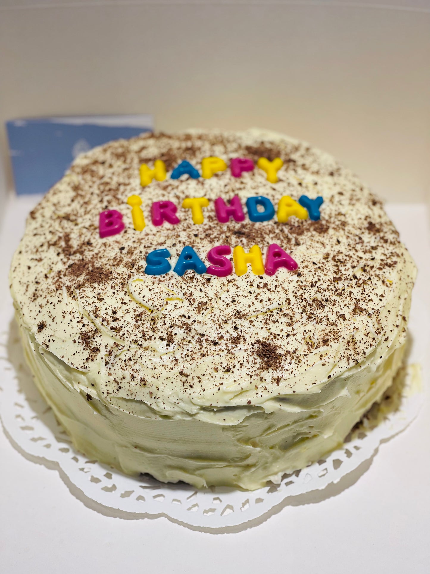 Red Velvet Sponge Covered In Cream Cheese Frosting